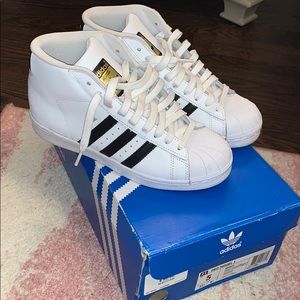 High top black and white Adidas